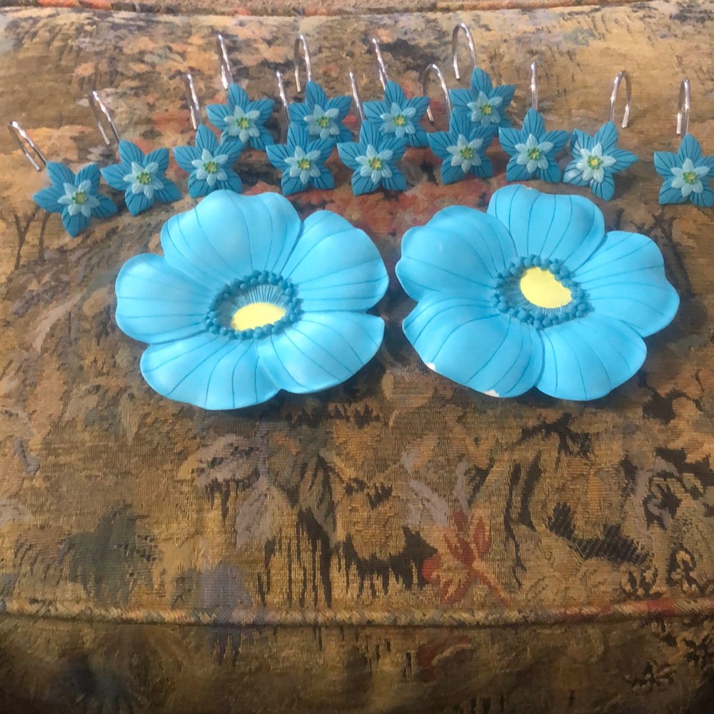 Studio D shower curtain hooks and wall plaques.